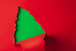 Christmas tree shape made with red and green paper