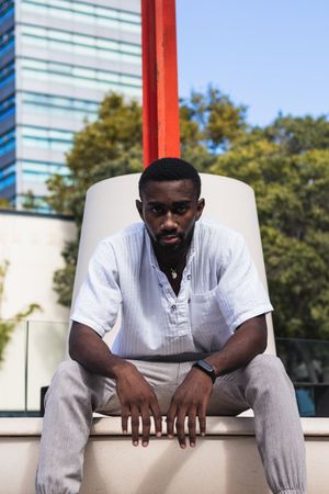 Stylish Black man in city street
