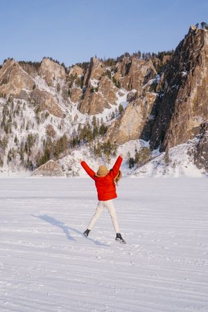 Frozen woman wrapped in scarf on winter day