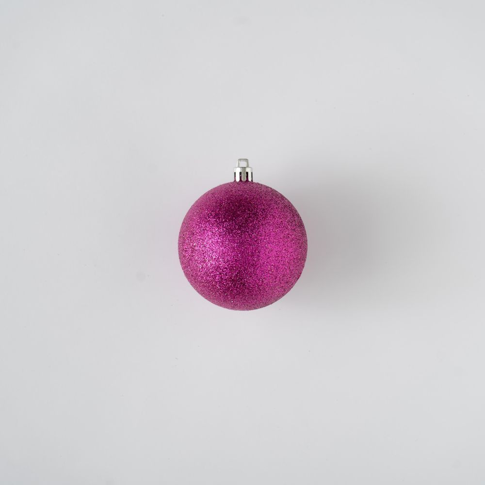 Pink holiday decoration on light background