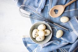 Cooking concept with speckled eggs