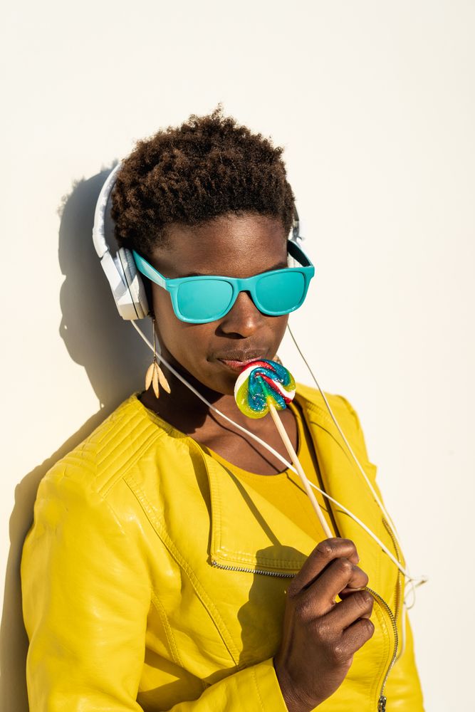 Black woman eating candy