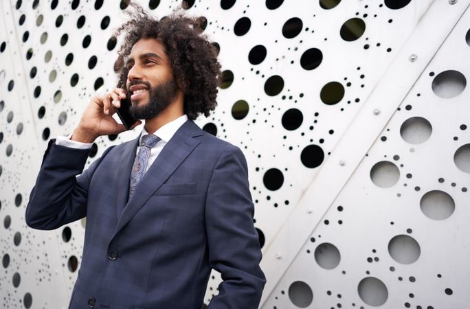 Presentable businessman during phone conversation