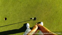Perspective of professional golfer playing golf on field 4m9pB4