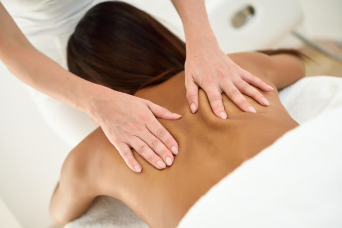 Woman having a back massage from a professional