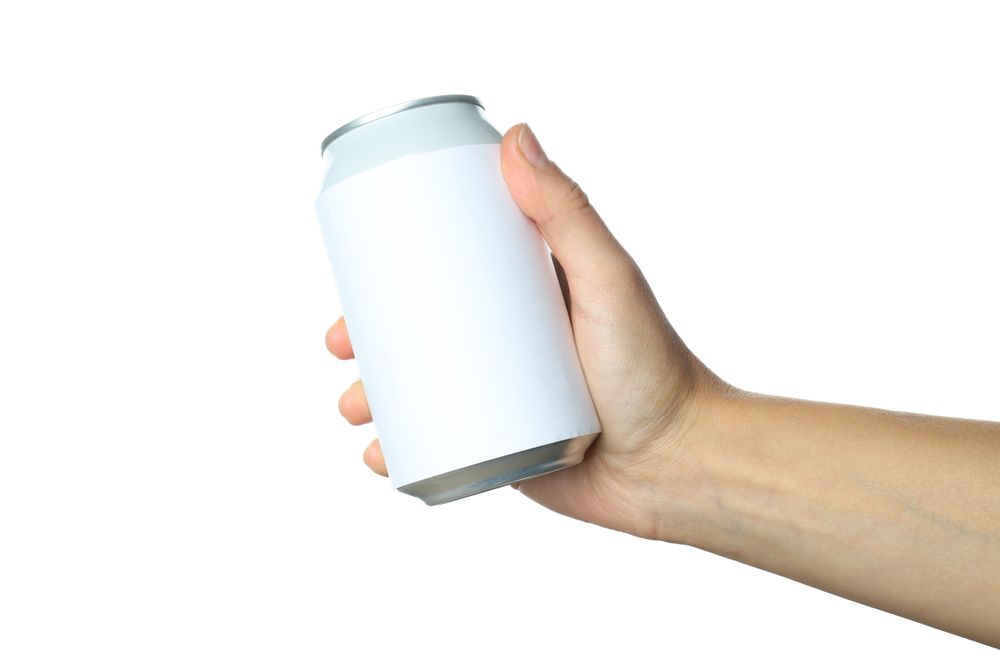 Female hand holds blank can, isolated on blank background