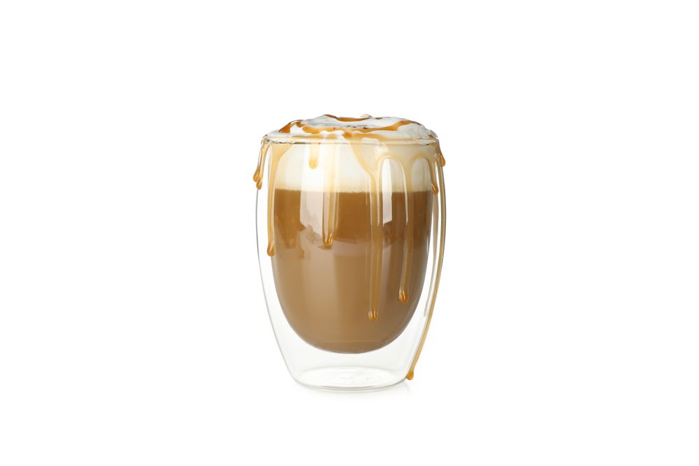 Glass of latte isolated on blank background