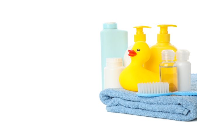 Baby hygiene accessories isolated on light background