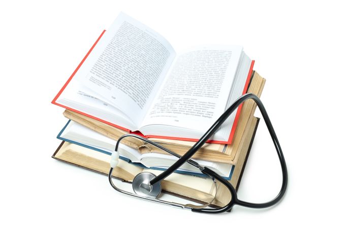 Concept of medical education, isolated on light background