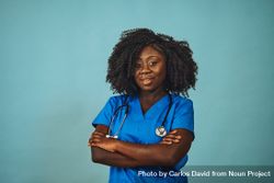 Portrait of confident Black medical professional dressed in scrubs 0WRQ6b