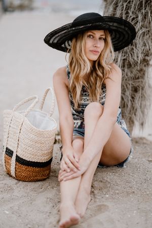 Young female relaxing on beach