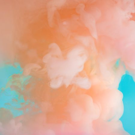 Cloud-like pastel pink color paint with teal background
