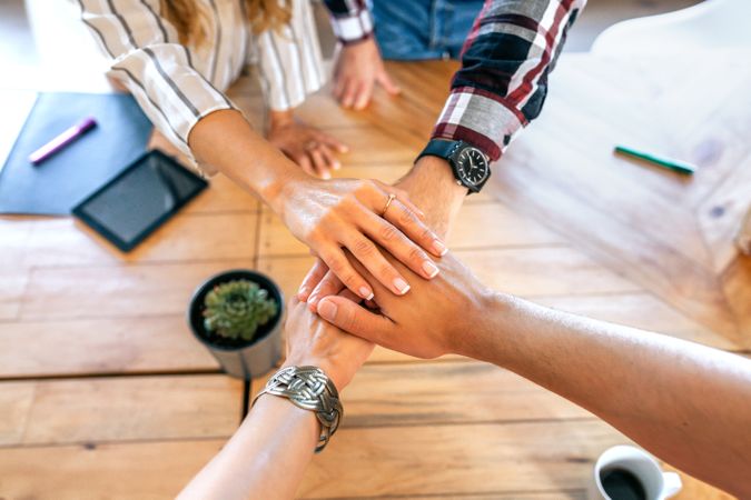 Business people hands together in the office