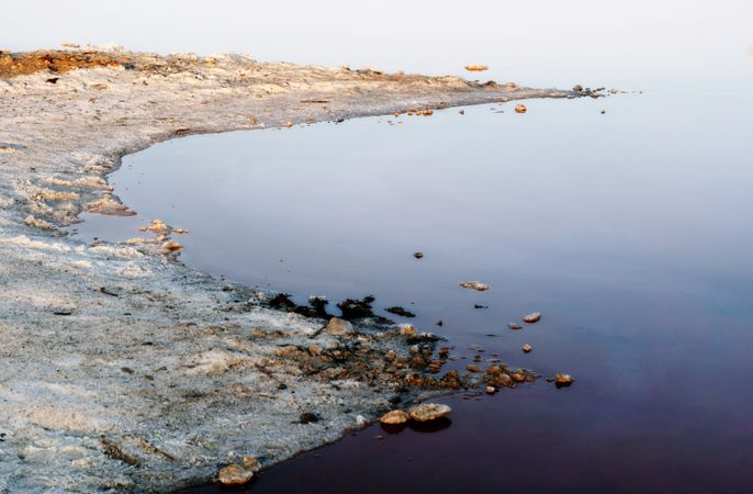 Beautiful lake with rocks in blue water