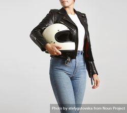 Woman in dark leather jacket with light t-shirt posing with motorcycle helmet 4dBQA0