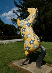 A painted, rearing horse statue outside the Round Barn & Farm Market, Biglerville, Pennsylvania