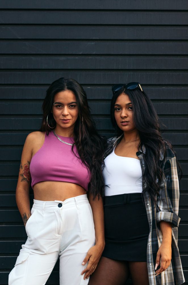 Portrait of two latina women outdoors