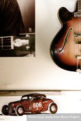 Vintage bass guitar and classic car poster on the way 4mBaBb