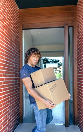 Man carrying moving boxes