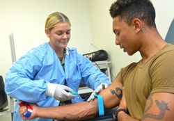 Jacksonville, FL - USA, Dec 9, 2020: Nurse drawing blood of patient