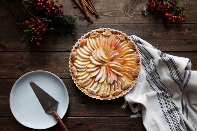 tasty apple pie on a wooden table ready to eat