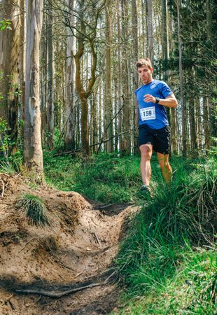 Man participating in trail race