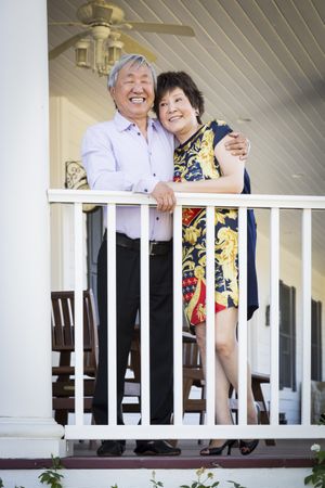 Chinese Couple Enjoying Their House