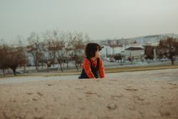Girl climbing a small hill