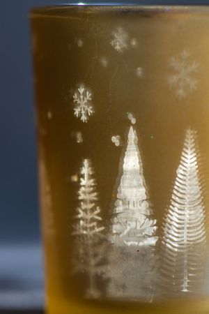 Christmas candle glass in sunny day