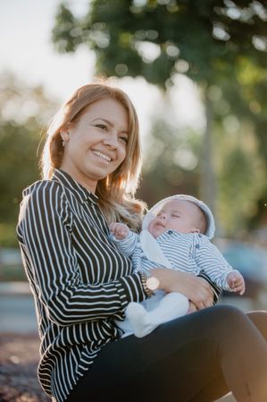 young mother hugging his baby with down syndrome