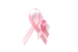 Pink awareness ribbons isolated on blank background, top view