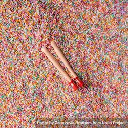 Doll legs buried in colorful sprinkles 5opVg4