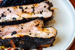 Close up of roasted pork meat with vegetables