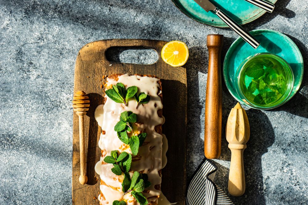 Homemade lemon cake with fresh mint garnish