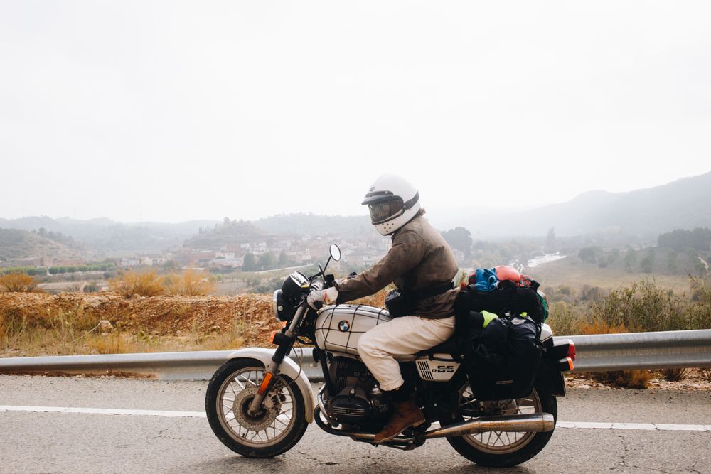 Side view of motorcyclist in full gear