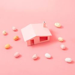 Easter eggs around pink house