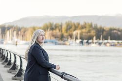 Woman taking a moment near the water