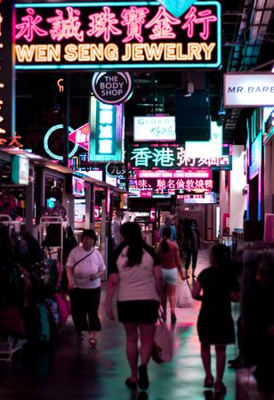People walking on street during nighttime