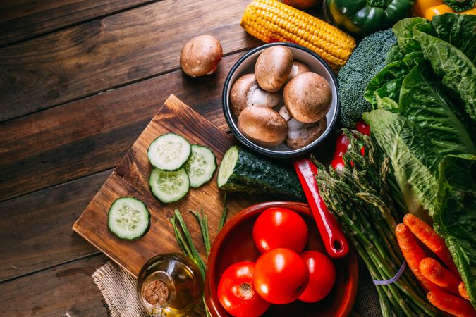 Vegetables and utensils on kitchen table