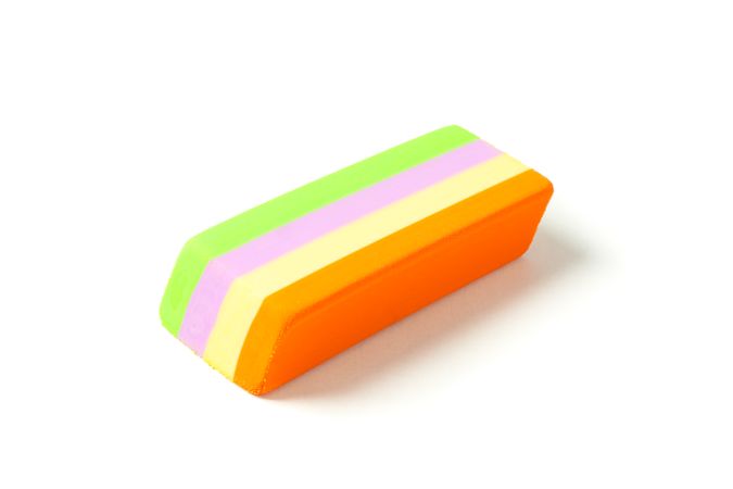 Multicolor eraser isolated on studio background, closeup