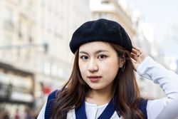 Young Asian Woman Posing in the City