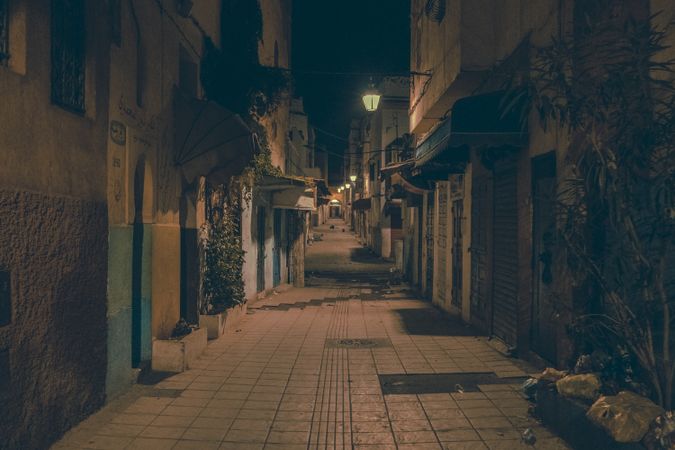 Old narrow street of town at night
