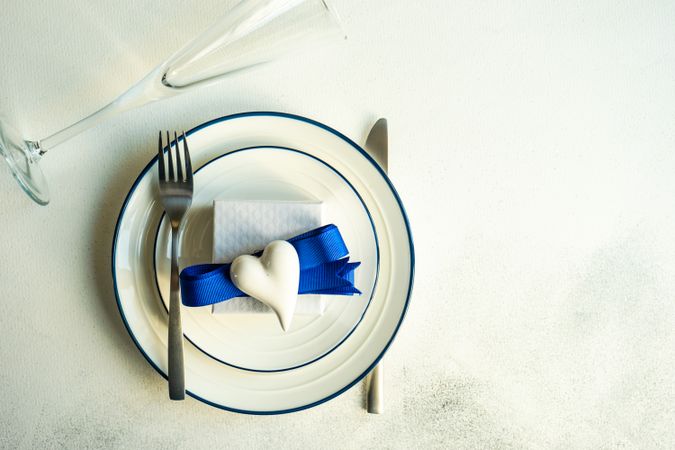 Top view of table setting with blue Valentine theme with copy space