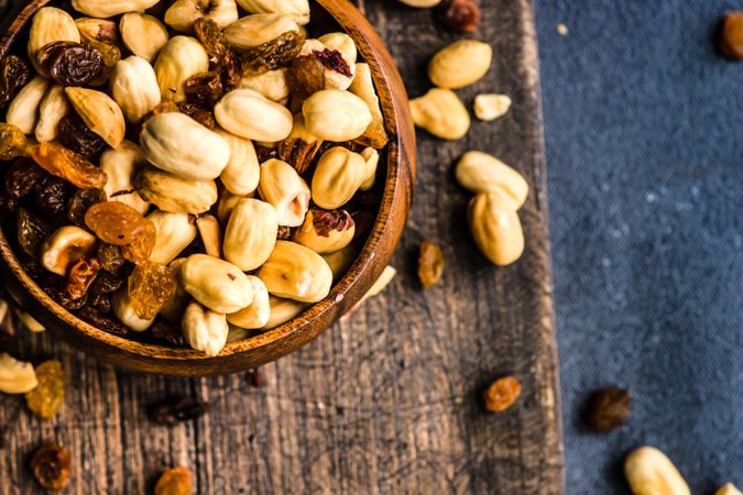 Top view of healthy nuts on wooden board