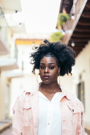 Portrait of a pretty Black woman with afro hair