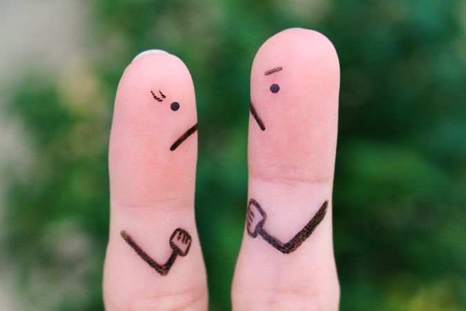 Fingers art of couple during quarrel.