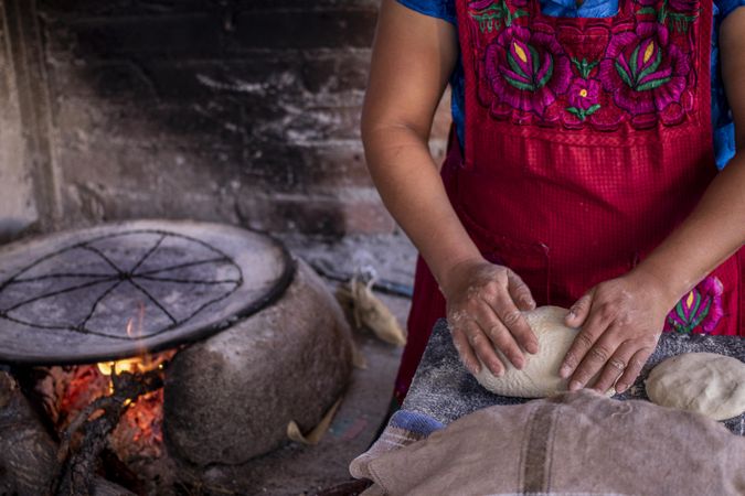 Close-up shot of woman making dough