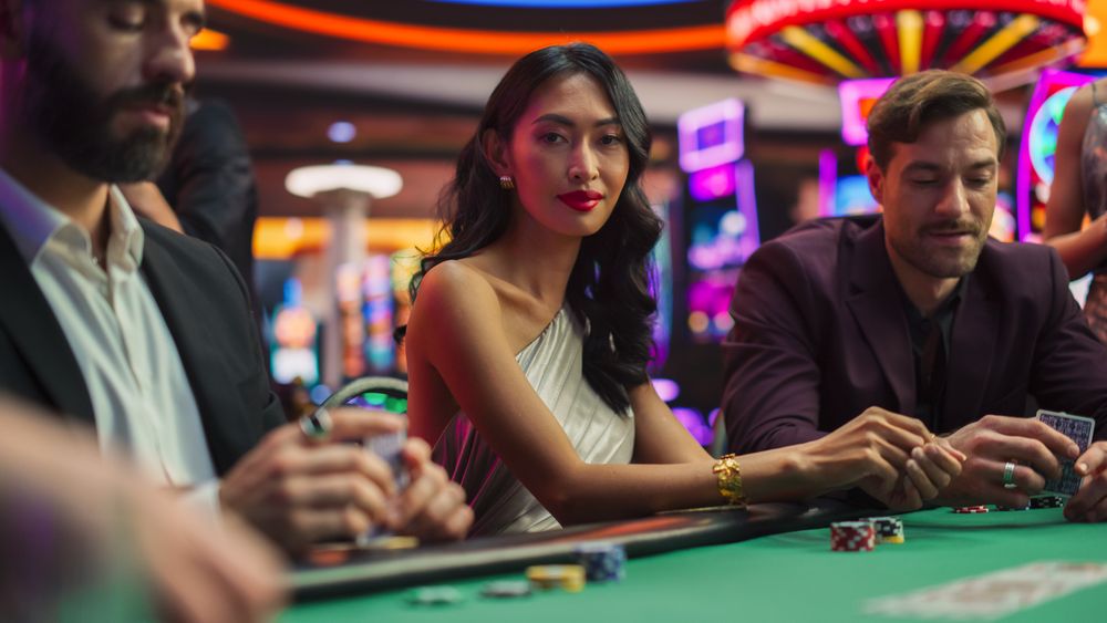 Portrait of a Glamorous Asian Woman at a Poker Gambling Table in Casino.