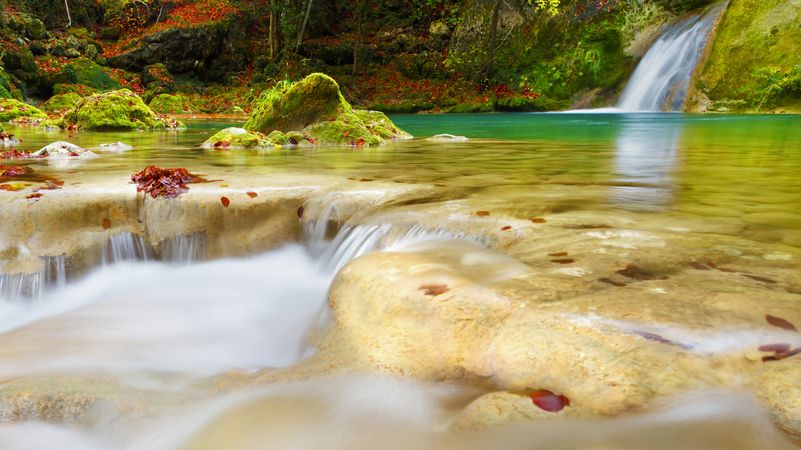 Amazing waterfalls of aquifer with bright vegetation