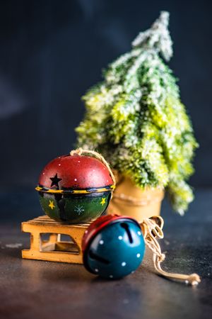 Ornamental Christmas bells on miniature sleigh
